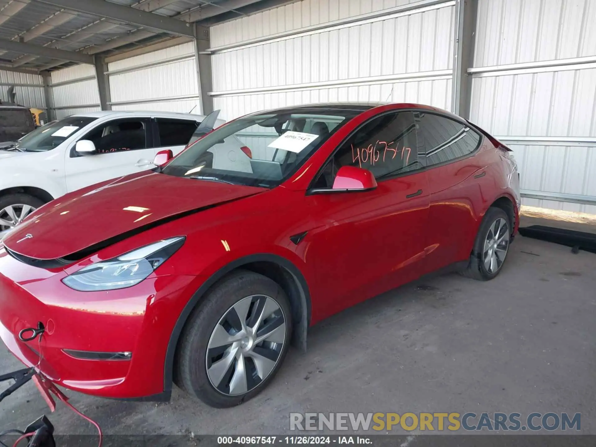 2 fotografías del automóvil dañado 7SAYGDEE5PF839148 TESLA MODEL Y 2023