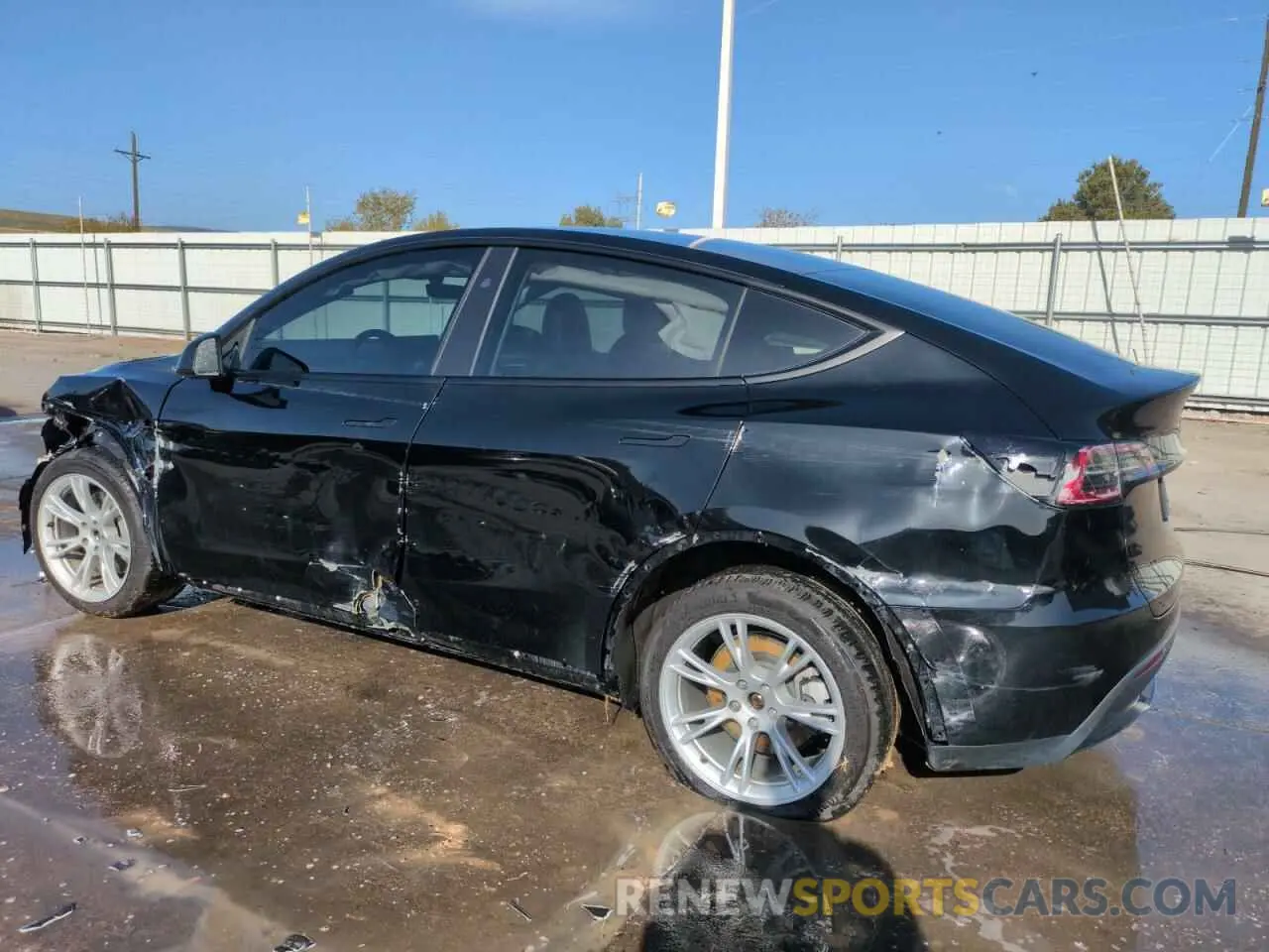 2 fotografías del automóvil dañado 7SAYGDEE5PF850358 TESLA MODEL Y 2023