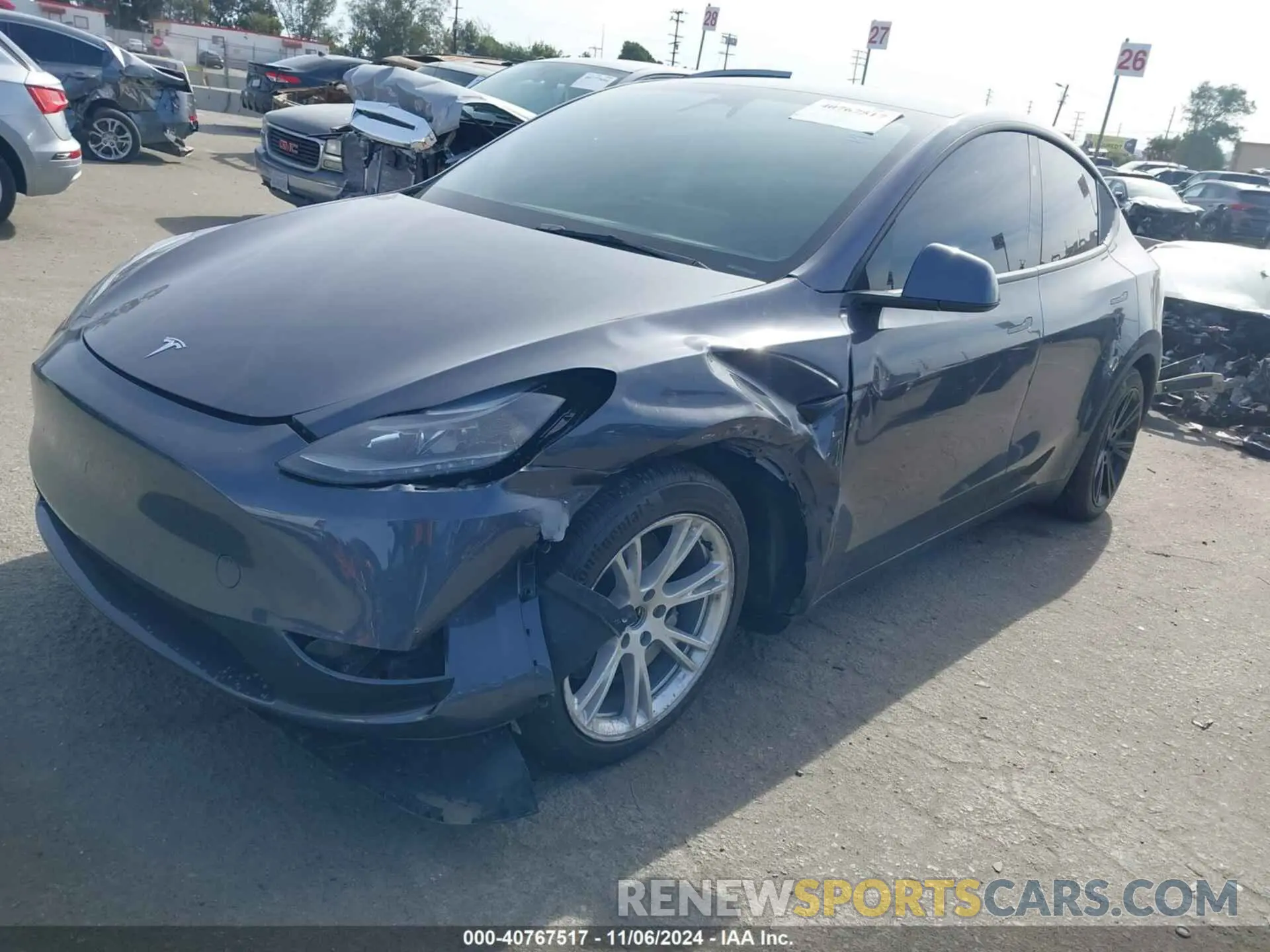 2 fotografías del automóvil dañado 7SAYGDEE5PF909067 TESLA MODEL Y 2023