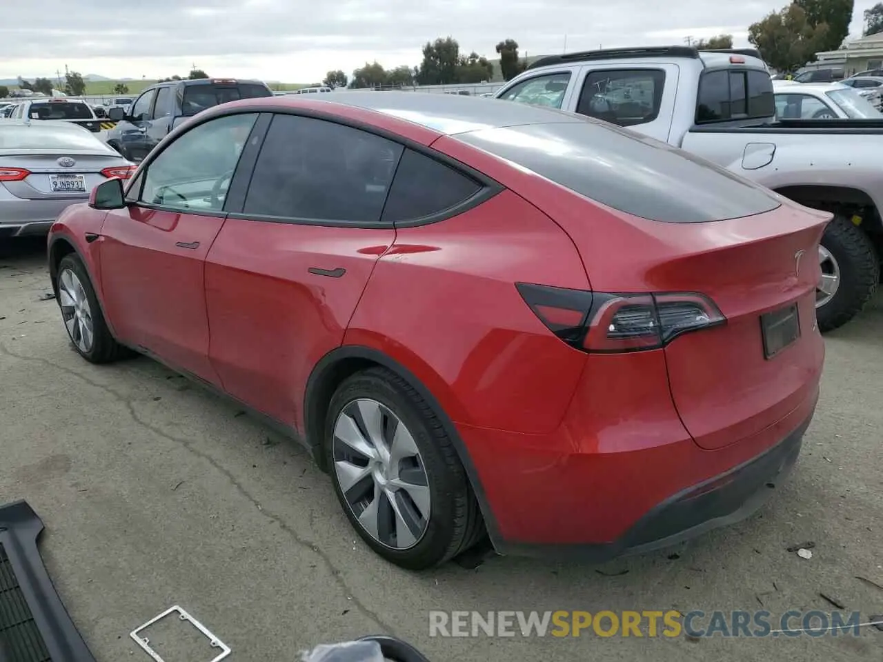 2 fotografías del automóvil dañado 7SAYGDEE5PF922398 TESLA MODEL Y 2023