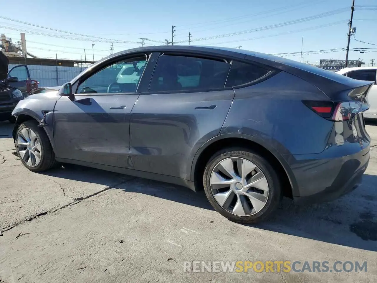 2 fotografías del automóvil dañado 7SAYGDEE6PA032862 TESLA MODEL Y 2023