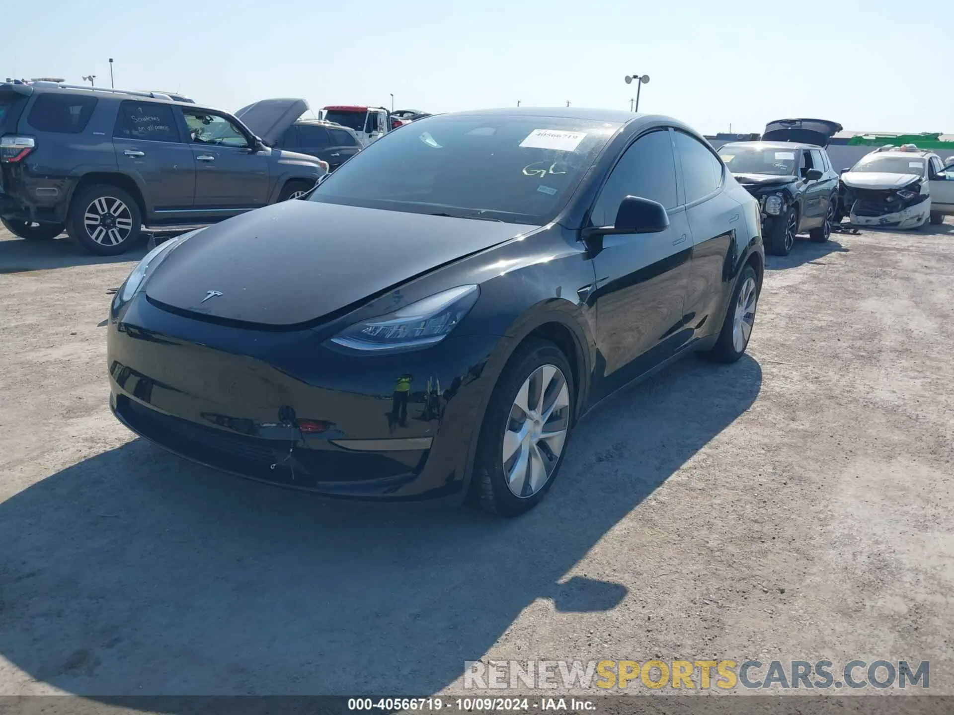 2 fotografías del automóvil dañado 7SAYGDEE6PA046695 TESLA MODEL Y 2023