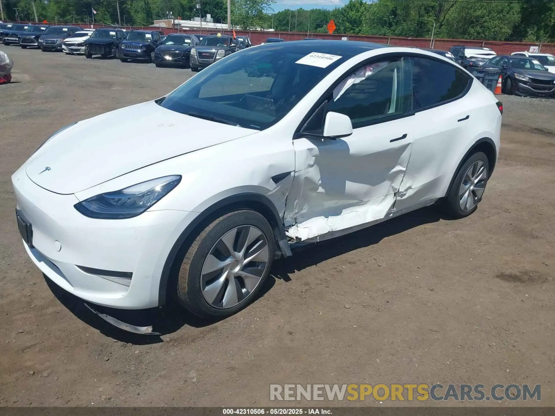 2 fotografías del automóvil dañado 7SAYGDEE6PA080118 TESLA MODEL Y 2023