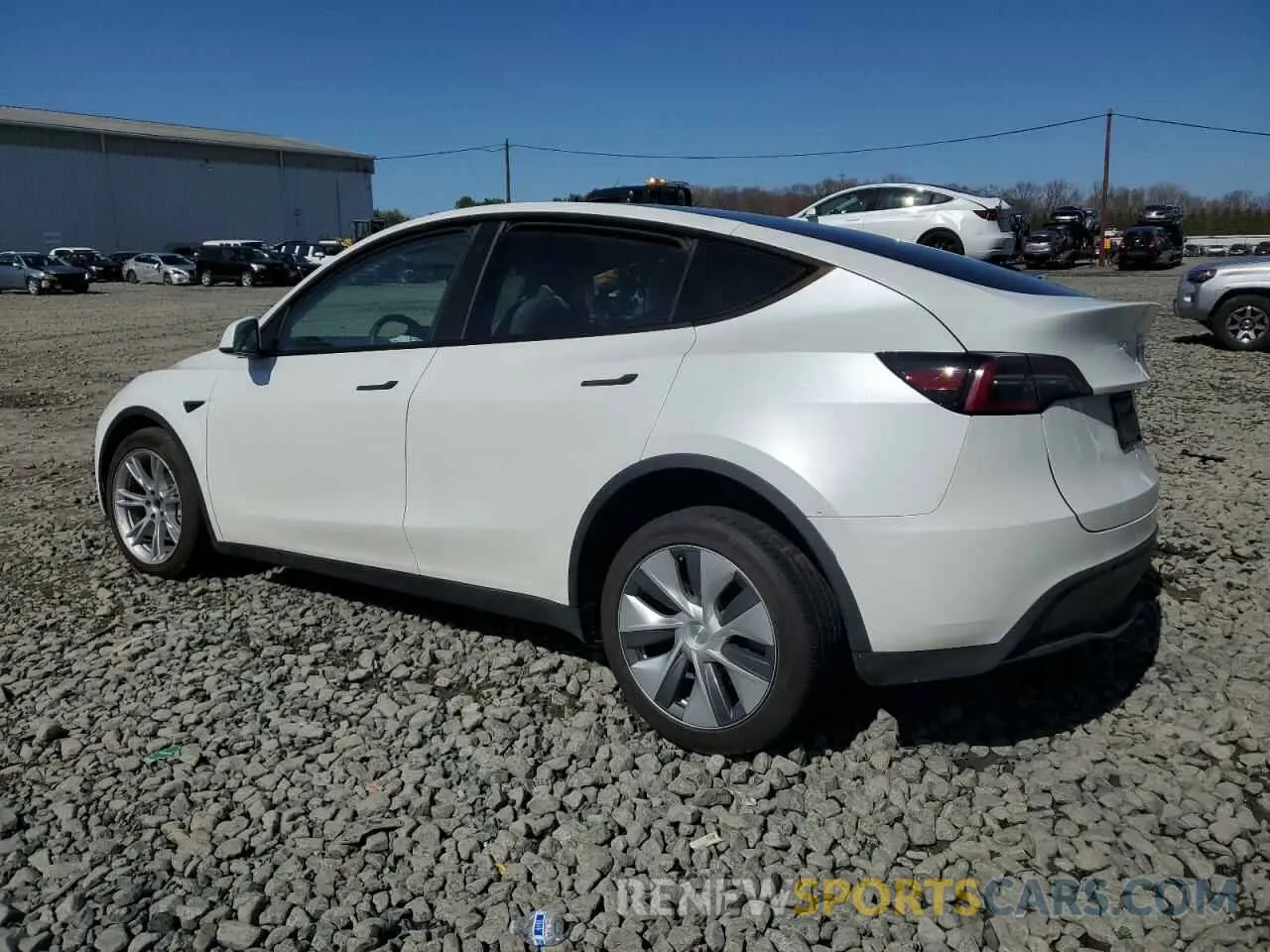 2 fotografías del automóvil dañado 7SAYGDEE6PA100058 TESLA MODEL Y 2023