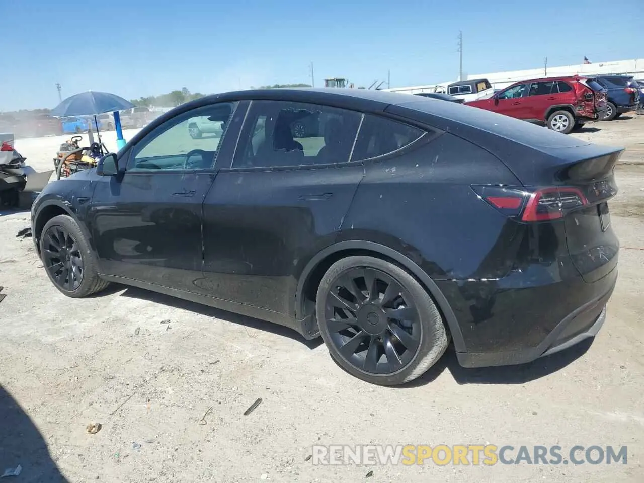 2 fotografías del automóvil dañado 7SAYGDEE6PA154153 TESLA MODEL Y 2023