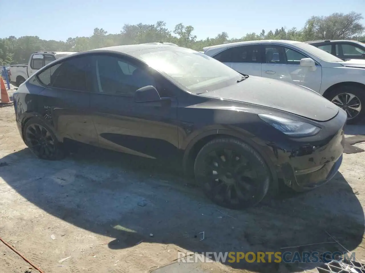 4 fotografías del automóvil dañado 7SAYGDEE6PA154153 TESLA MODEL Y 2023