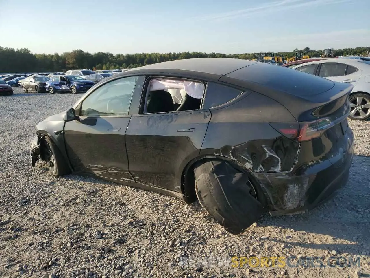 2 fotografías del automóvil dañado 7SAYGDEE6PA190991 TESLA MODEL Y 2023