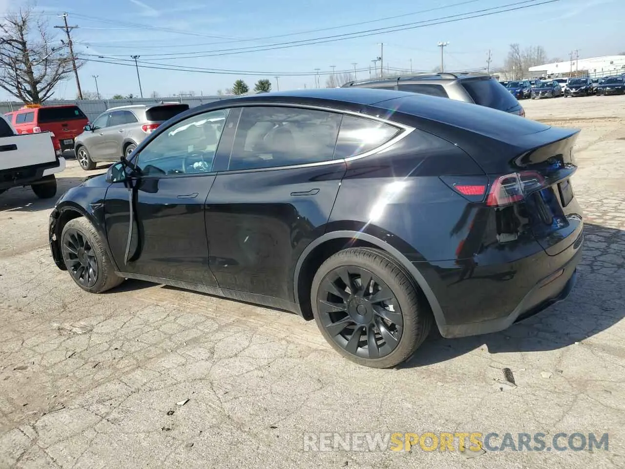 2 fotografías del automóvil dañado 7SAYGDEE6PA200614 TESLA MODEL Y 2023