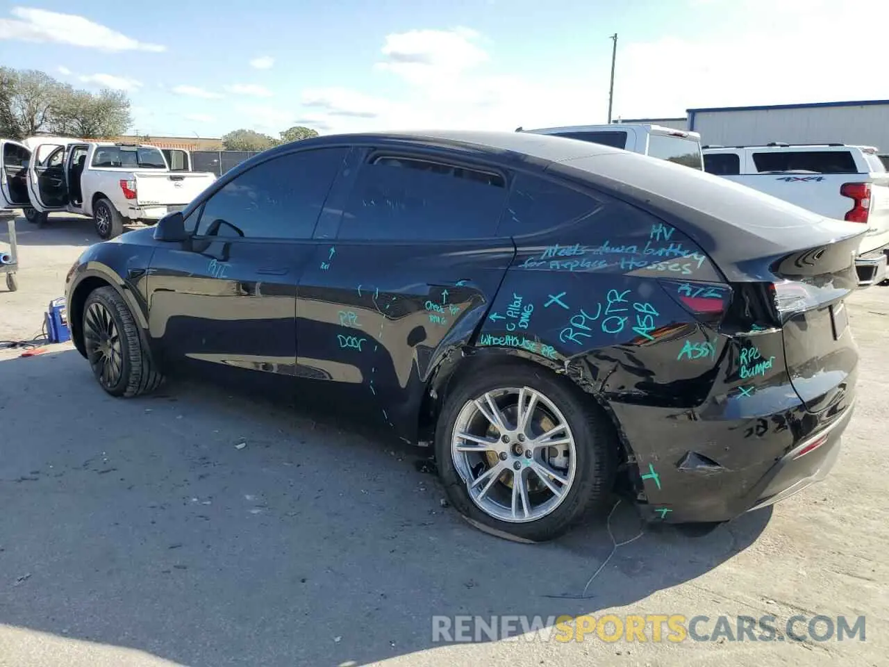 2 fotografías del automóvil dañado 7SAYGDEE6PA201875 TESLA MODEL Y 2023