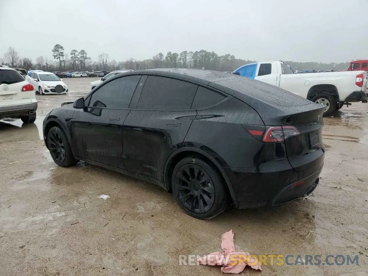 2 fotografías del automóvil dañado 7SAYGDEE6PA203349 TESLA MODEL Y 2023