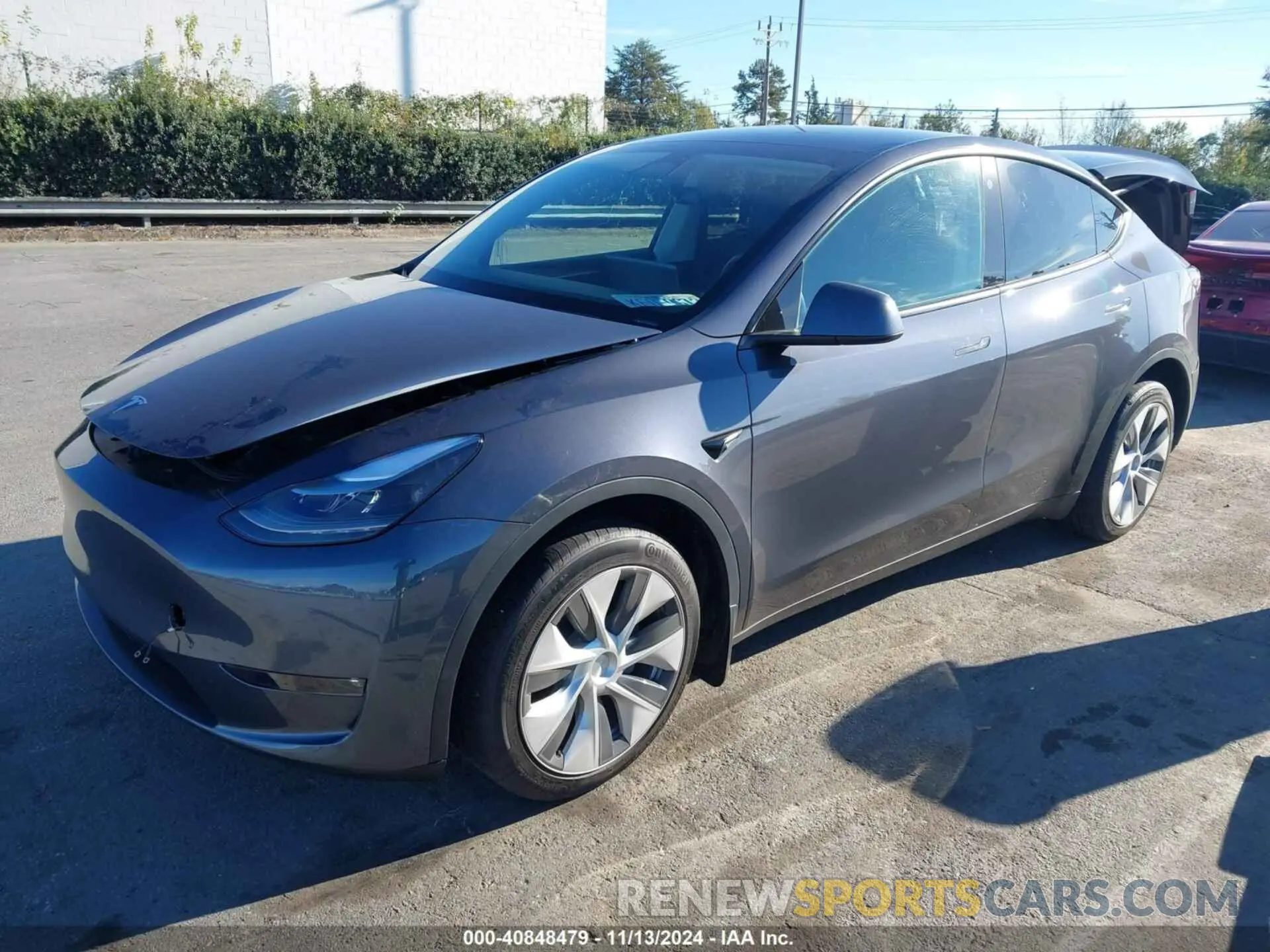 2 fotografías del automóvil dañado 7SAYGDEE6PF596126 TESLA MODEL Y 2023