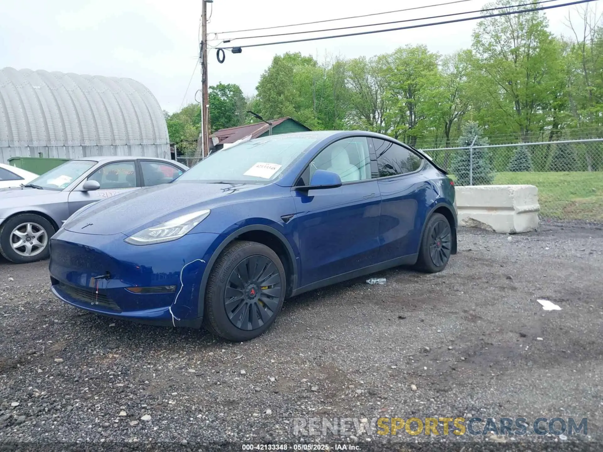2 fotografías del automóvil dañado 7SAYGDEE6PF603981 TESLA MODEL Y 2023