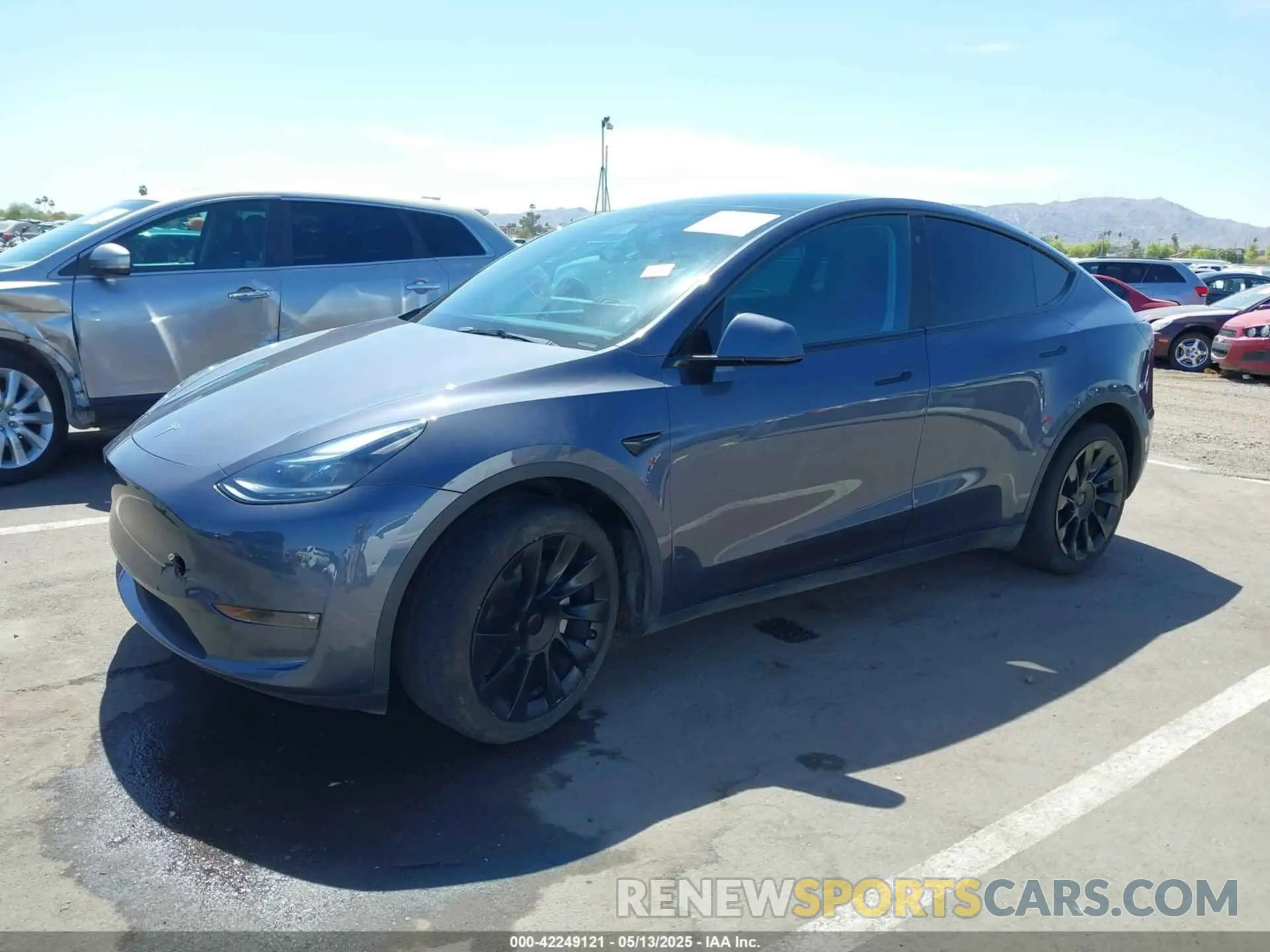 2 fotografías del automóvil dañado 7SAYGDEE6PF691155 TESLA MODEL Y 2023