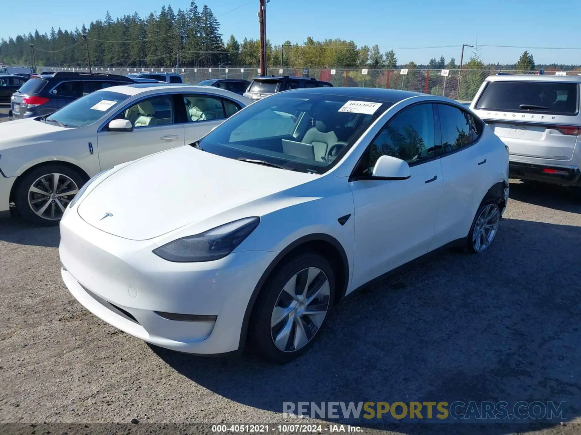 2 fotografías del automóvil dañado 7SAYGDEE6PF807244 TESLA MODEL Y 2023