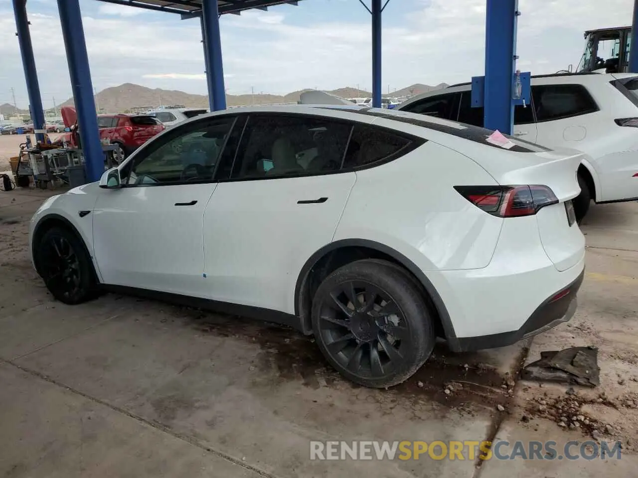 2 fotografías del automóvil dañado 7SAYGDEE6PF858274 TESLA MODEL Y 2023
