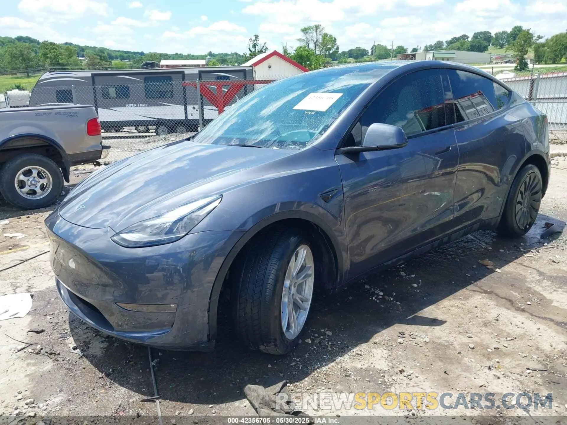 2 fotografías del automóvil dañado 7SAYGDEE6PF892439 TESLA MODEL Y 2023