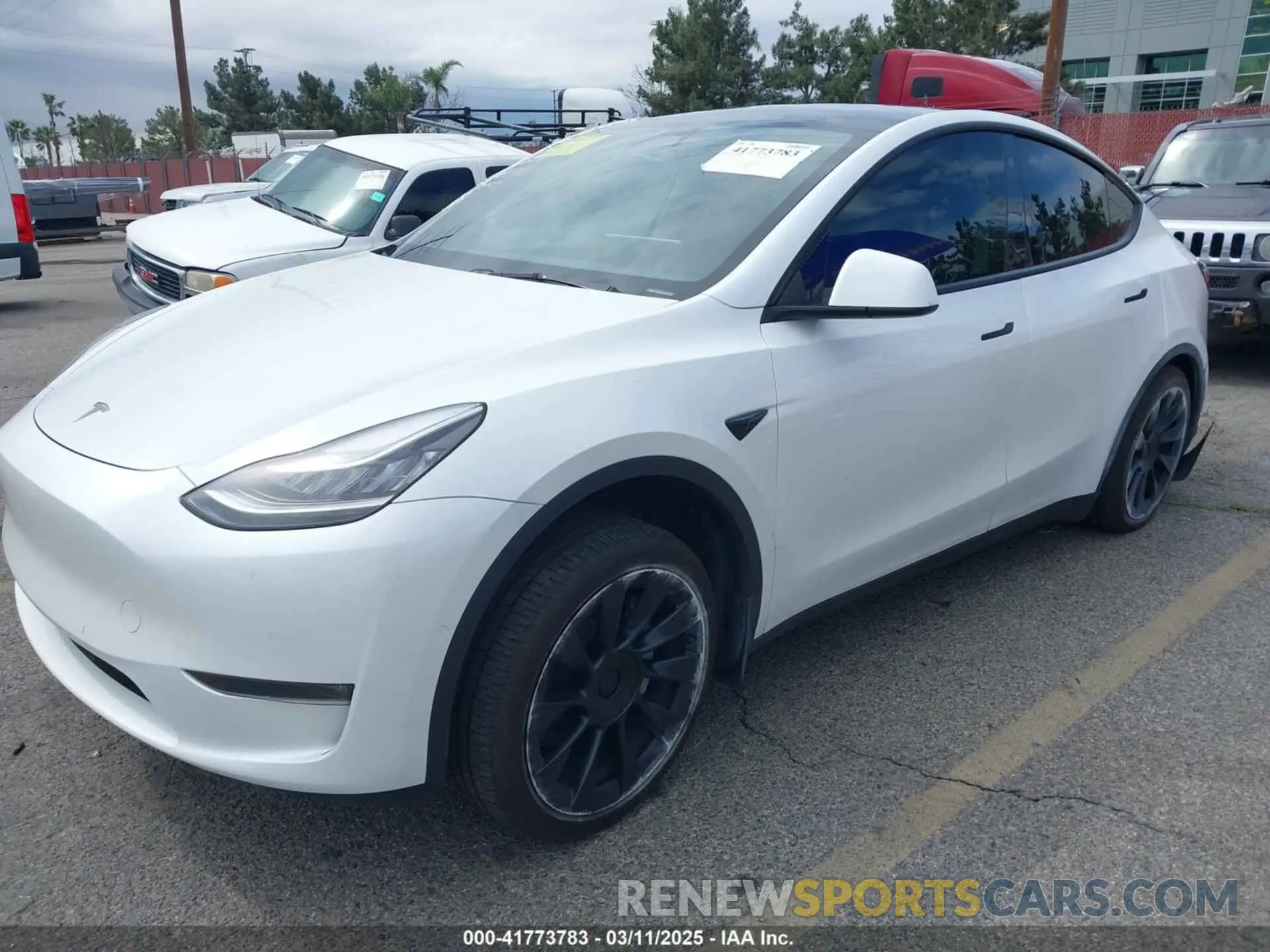 2 fotografías del automóvil dañado 7SAYGDEE7PA023295 TESLA MODEL Y 2023