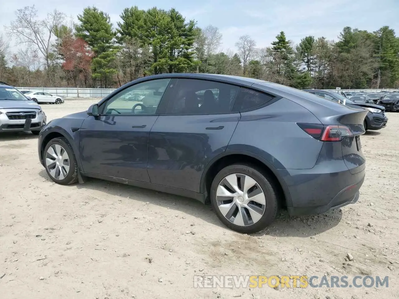 2 fotografías del automóvil dañado 7SAYGDEE7PA031199 TESLA MODEL Y 2023