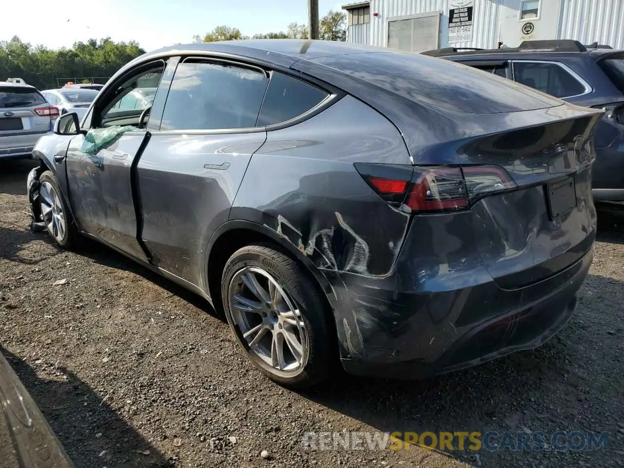 2 fotografías del automóvil dañado 7SAYGDEE7PA037276 TESLA MODEL Y 2023