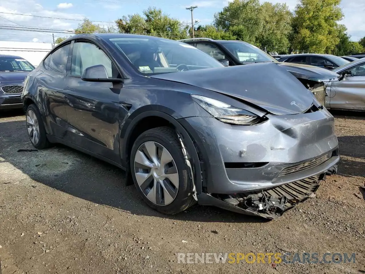 4 fotografías del automóvil dañado 7SAYGDEE7PA037276 TESLA MODEL Y 2023