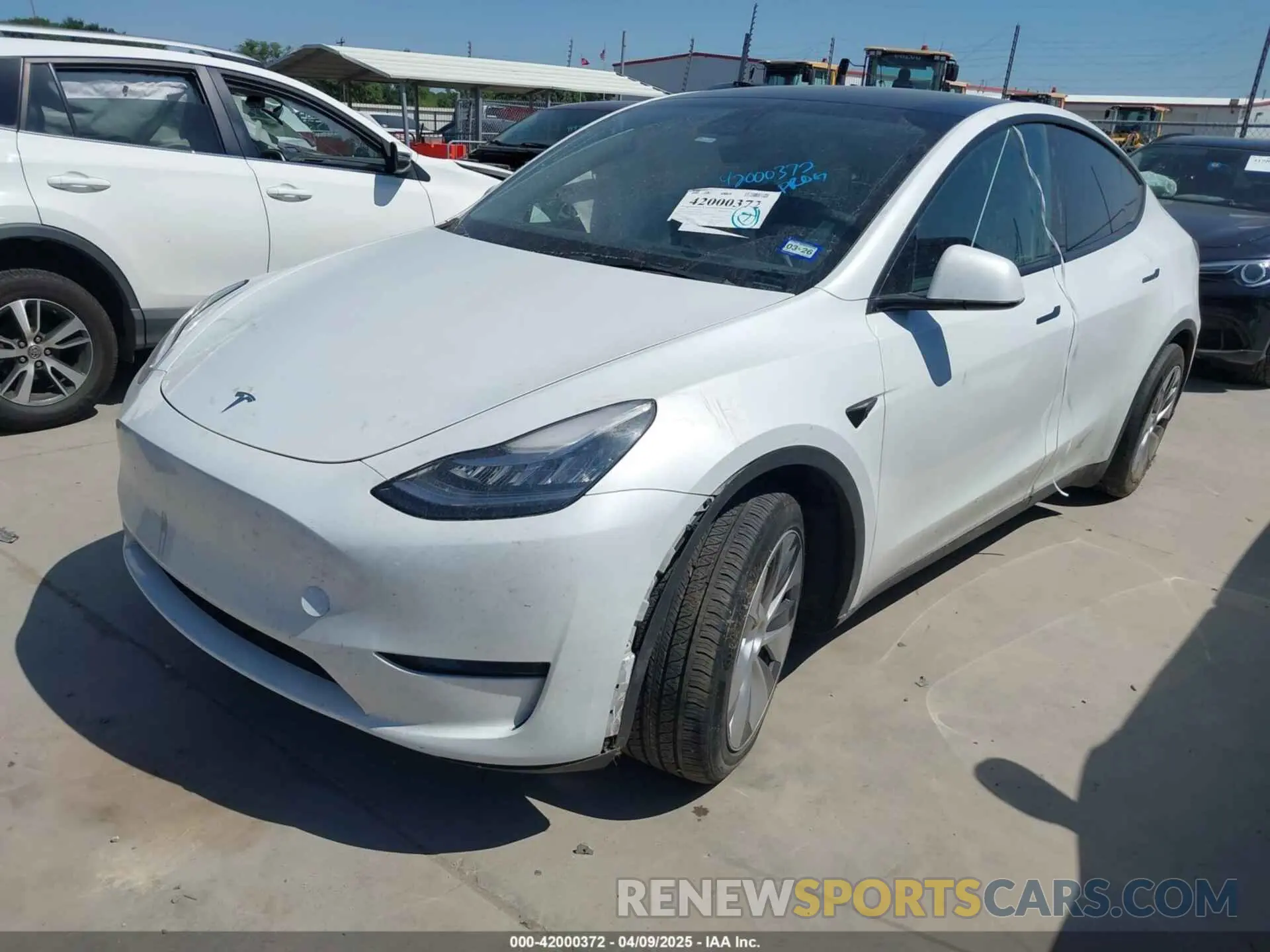 2 fotografías del automóvil dañado 7SAYGDEE7PA062551 TESLA MODEL Y 2023