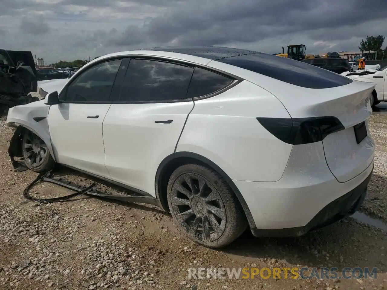 2 fotografías del automóvil dañado 7SAYGDEE7PA086333 TESLA MODEL Y 2023