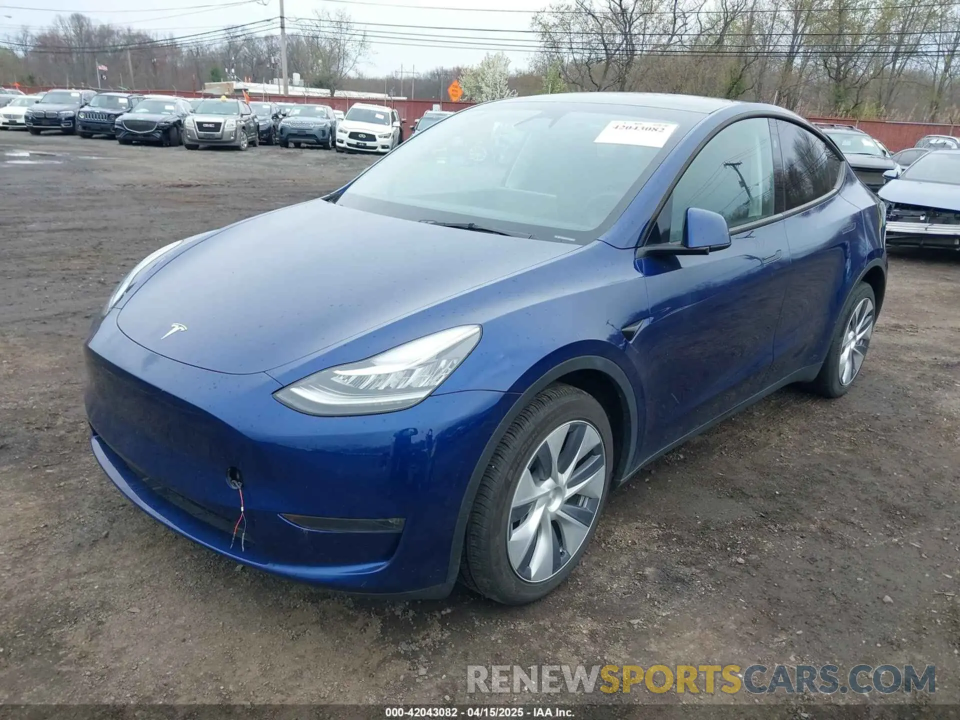 2 fotografías del automóvil dañado 7SAYGDEE7PA142013 TESLA MODEL Y 2023