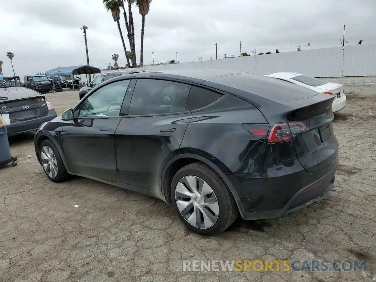 2 fotografías del automóvil dañado 7SAYGDEE7PA155411 TESLA MODEL Y 2023
