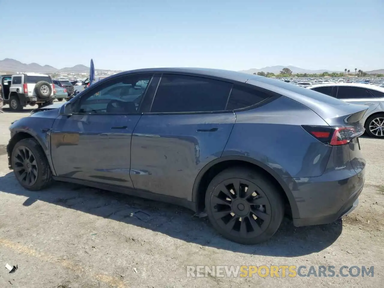 2 fotografías del automóvil dañado 7SAYGDEE7PA166103 TESLA MODEL Y 2023