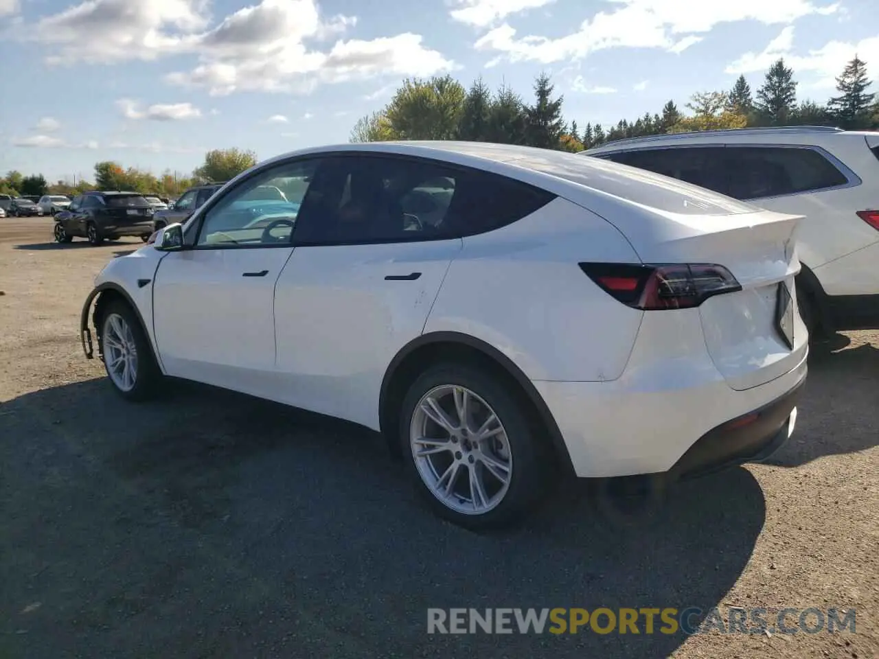2 fotografías del automóvil dañado 7SAYGDEE7PF597317 TESLA MODEL Y 2023