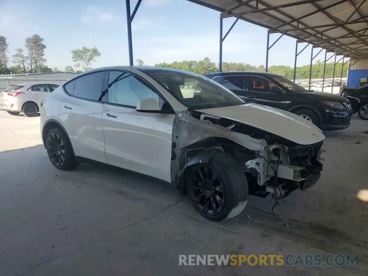 4 fotografías del automóvil dañado 7SAYGDEE7PF614925 TESLA MODEL Y 2023