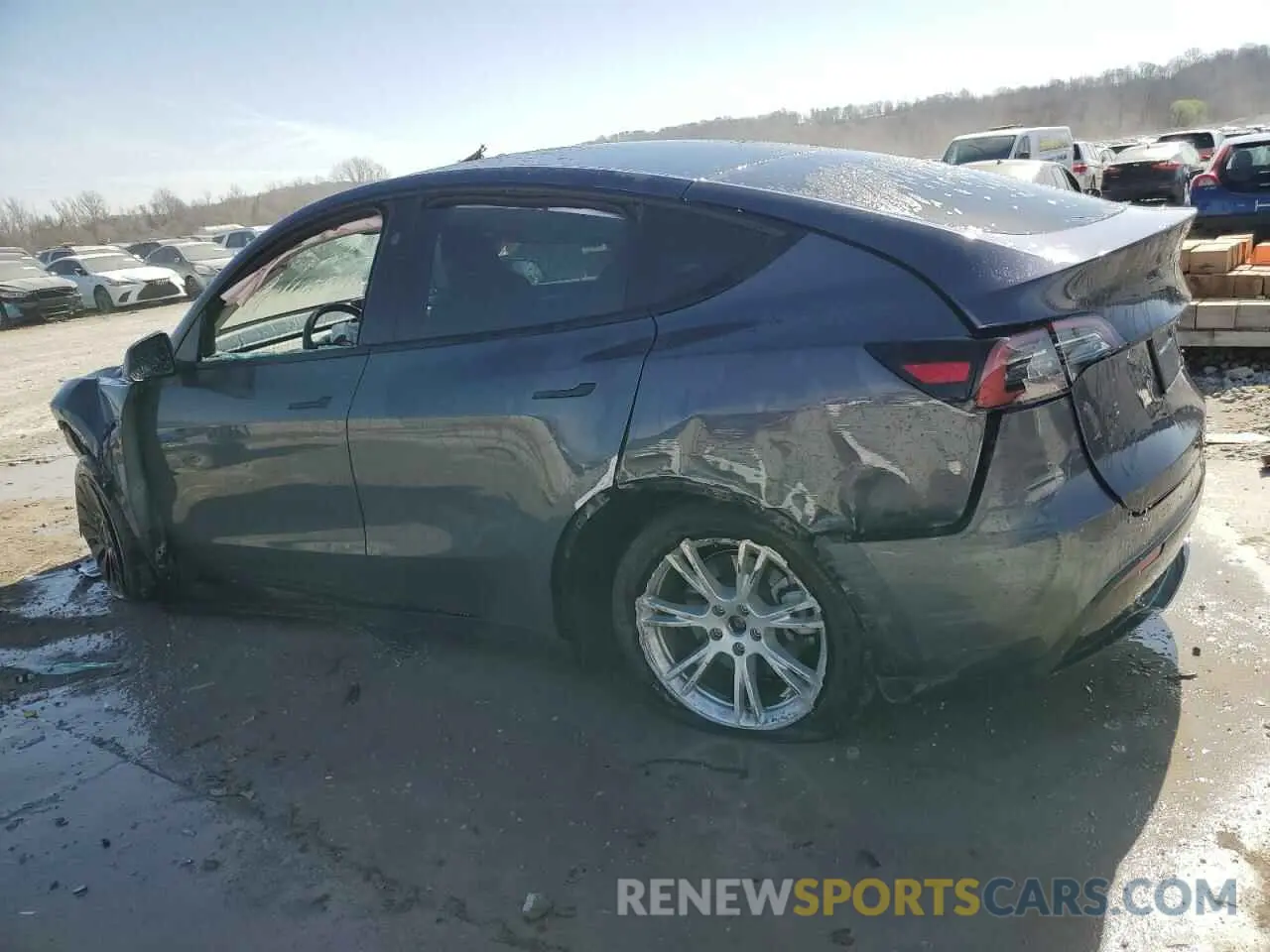 2 fotografías del automóvil dañado 7SAYGDEE7PF822934 TESLA MODEL Y 2023
