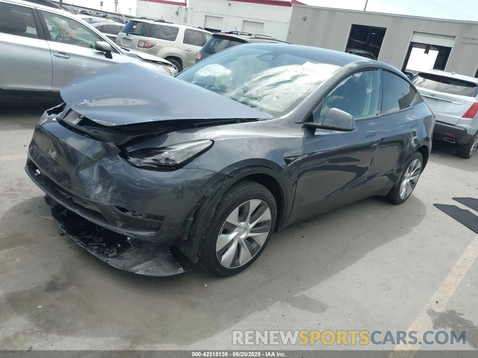 2 fotografías del automóvil dañado 7SAYGDEE7PF852113 TESLA MODEL Y 2023