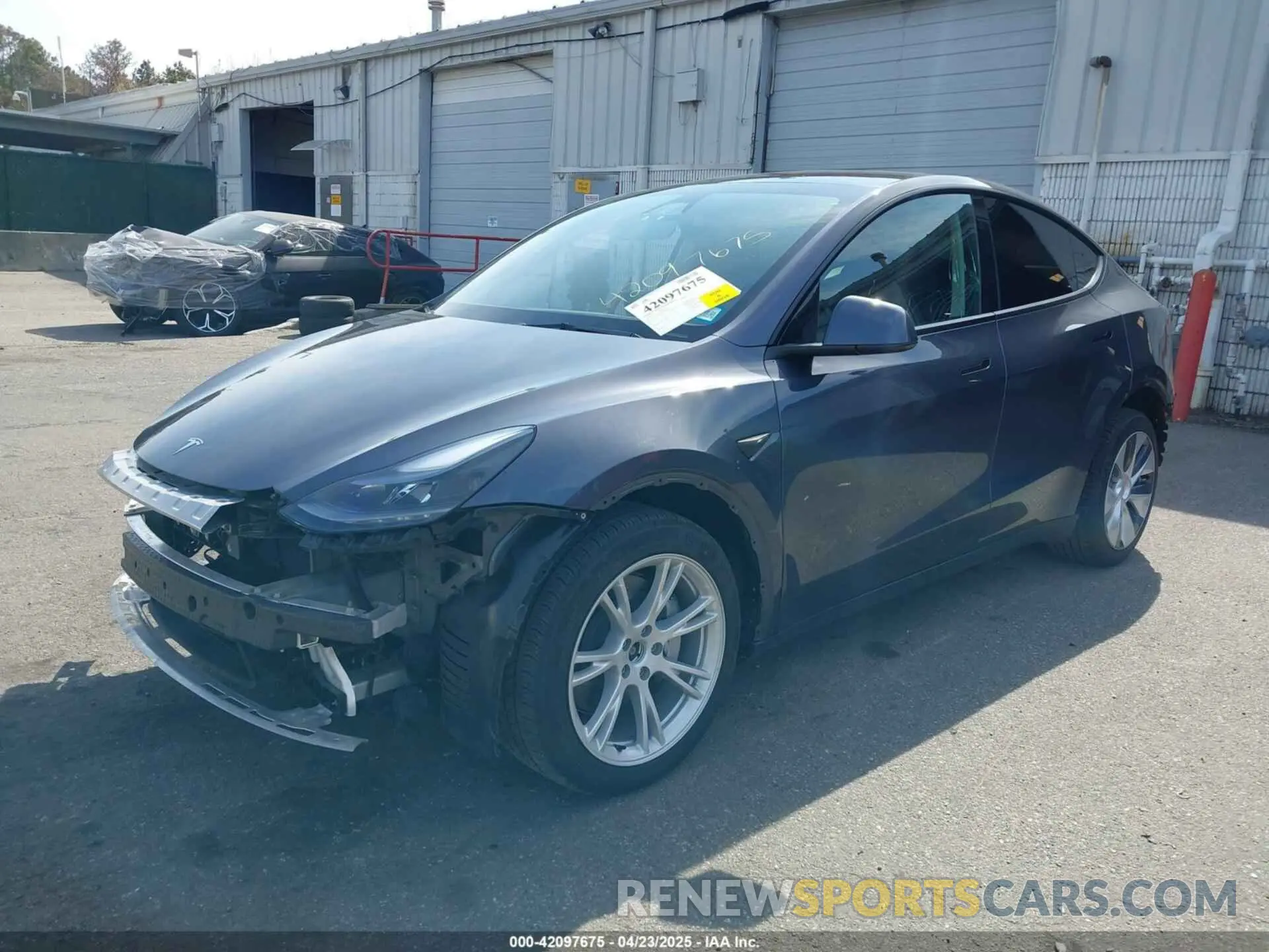 2 fotografías del automóvil dañado 7SAYGDEE7PF856985 TESLA MODEL Y 2023