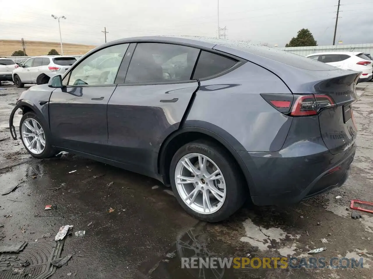 2 fotografías del automóvil dañado 7SAYGDEE7PF879523 TESLA MODEL Y 2023