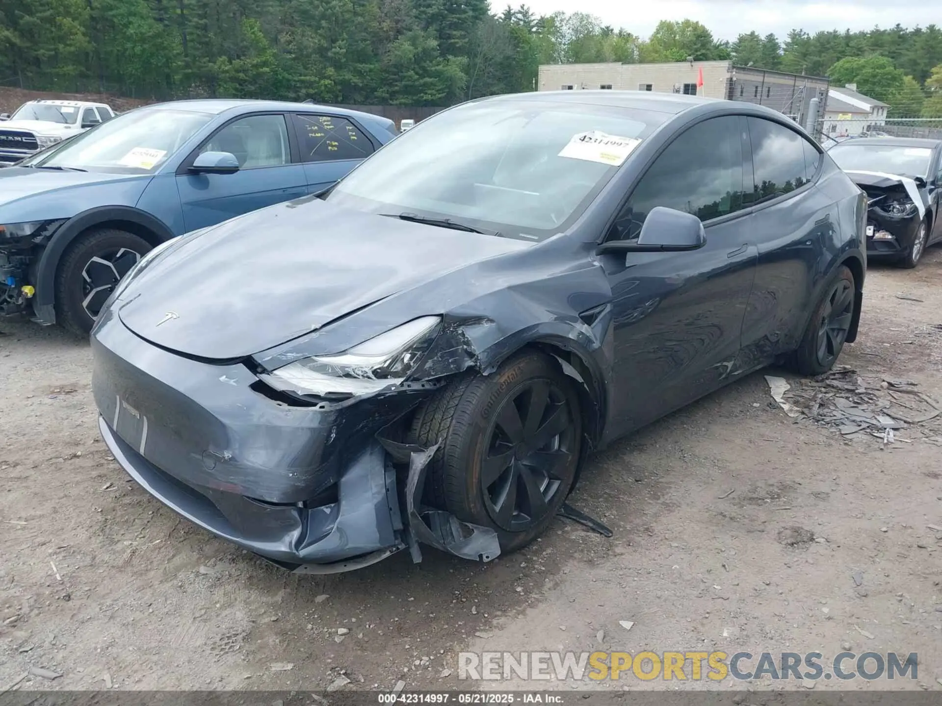 2 fotografías del automóvil dañado 7SAYGDEE8PA023354 TESLA MODEL Y 2023
