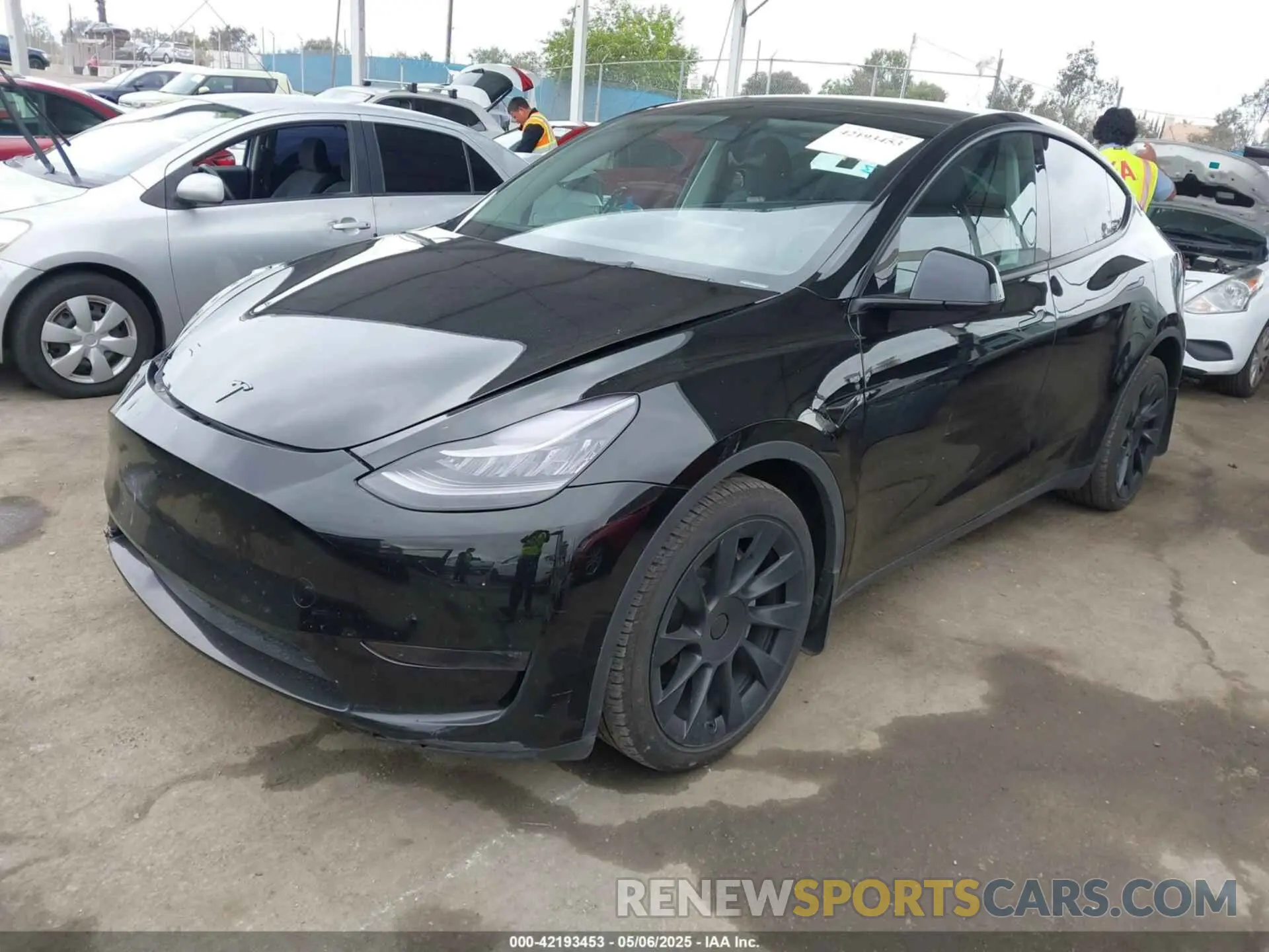 2 fotografías del automóvil dañado 7SAYGDEE8PA051798 TESLA MODEL Y 2023