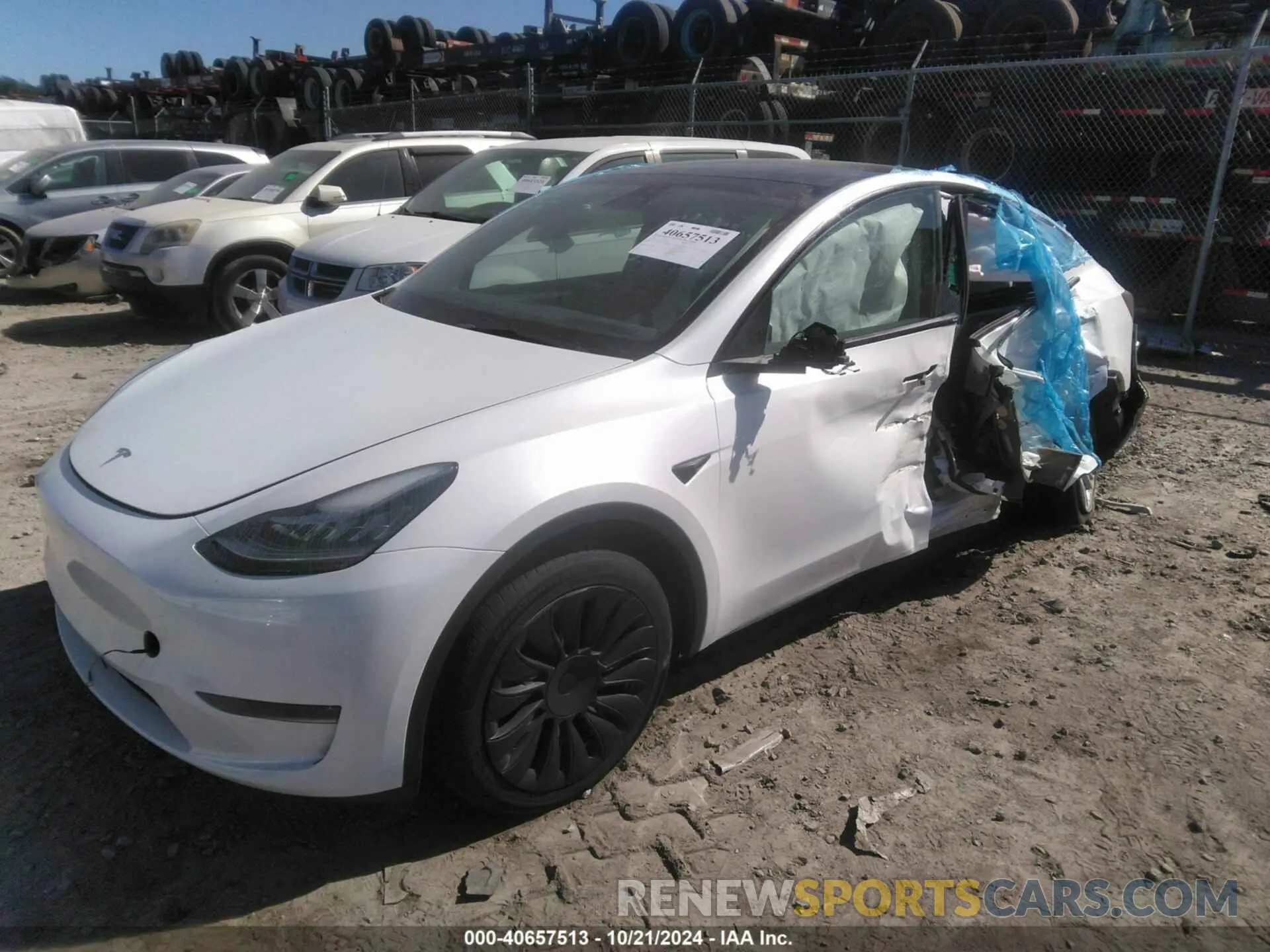 2 fotografías del automóvil dañado 7SAYGDEE8PA101924 TESLA MODEL Y 2023