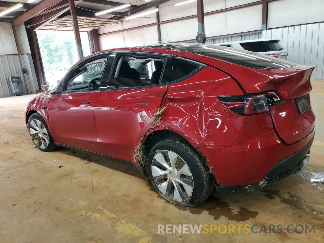 2 fotografías del automóvil dañado 7SAYGDEE8PA103379 TESLA MODEL Y 2023