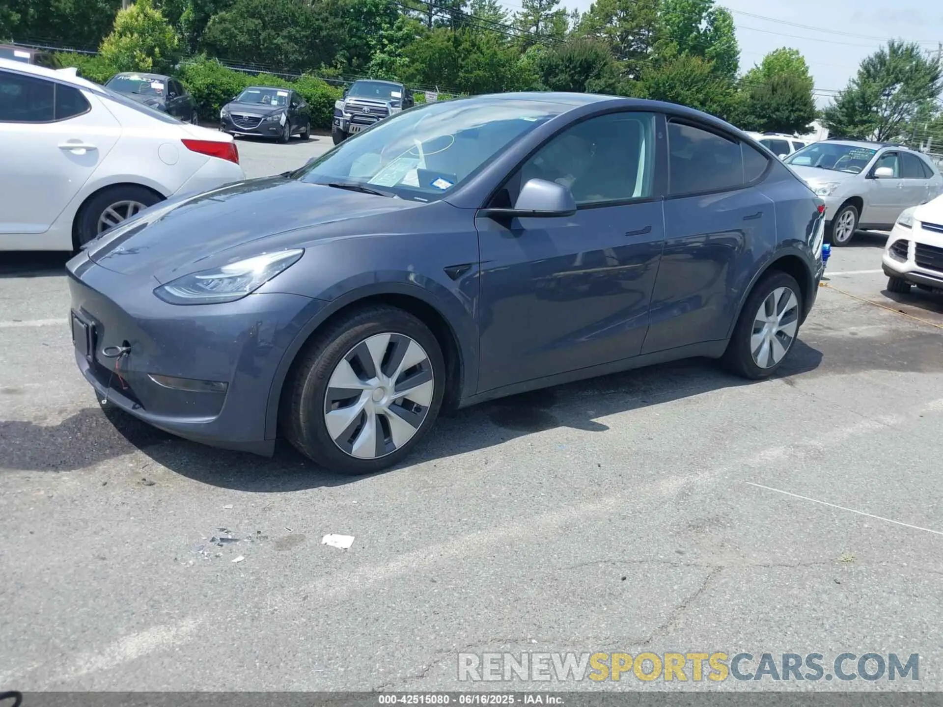 2 fotografías del automóvil dañado 7SAYGDEE8PA145857 TESLA MODEL Y 2023