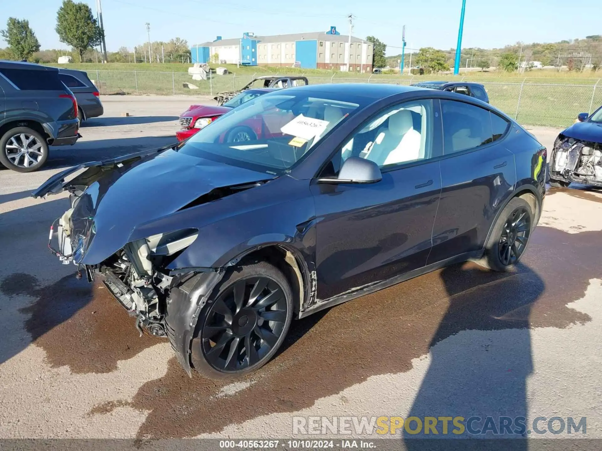 2 fotografías del automóvil dañado 7SAYGDEE8PA176557 TESLA MODEL Y 2023