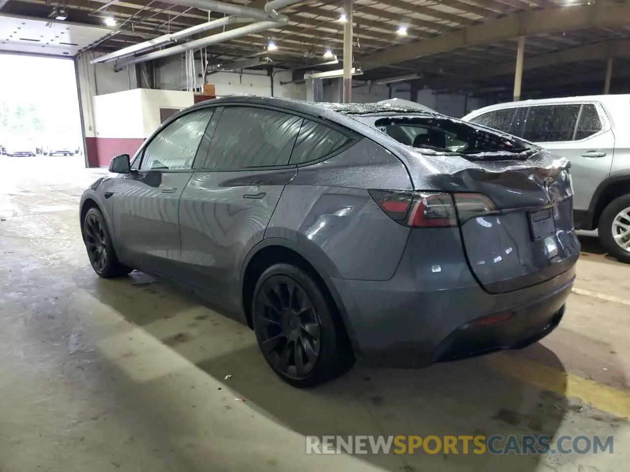 2 fotografías del automóvil dañado 7SAYGDEE8PF814874 TESLA MODEL Y 2023