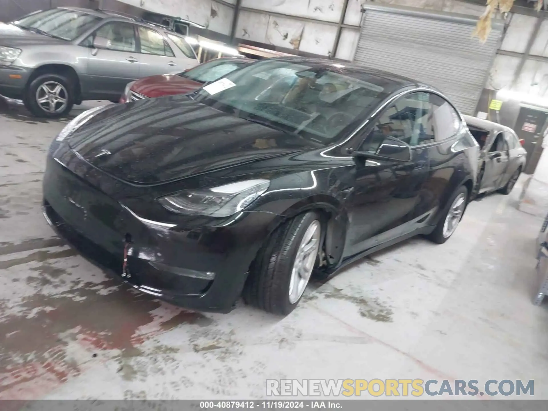 2 fotografías del automóvil dañado 7SAYGDEE8PF835000 TESLA MODEL Y 2023