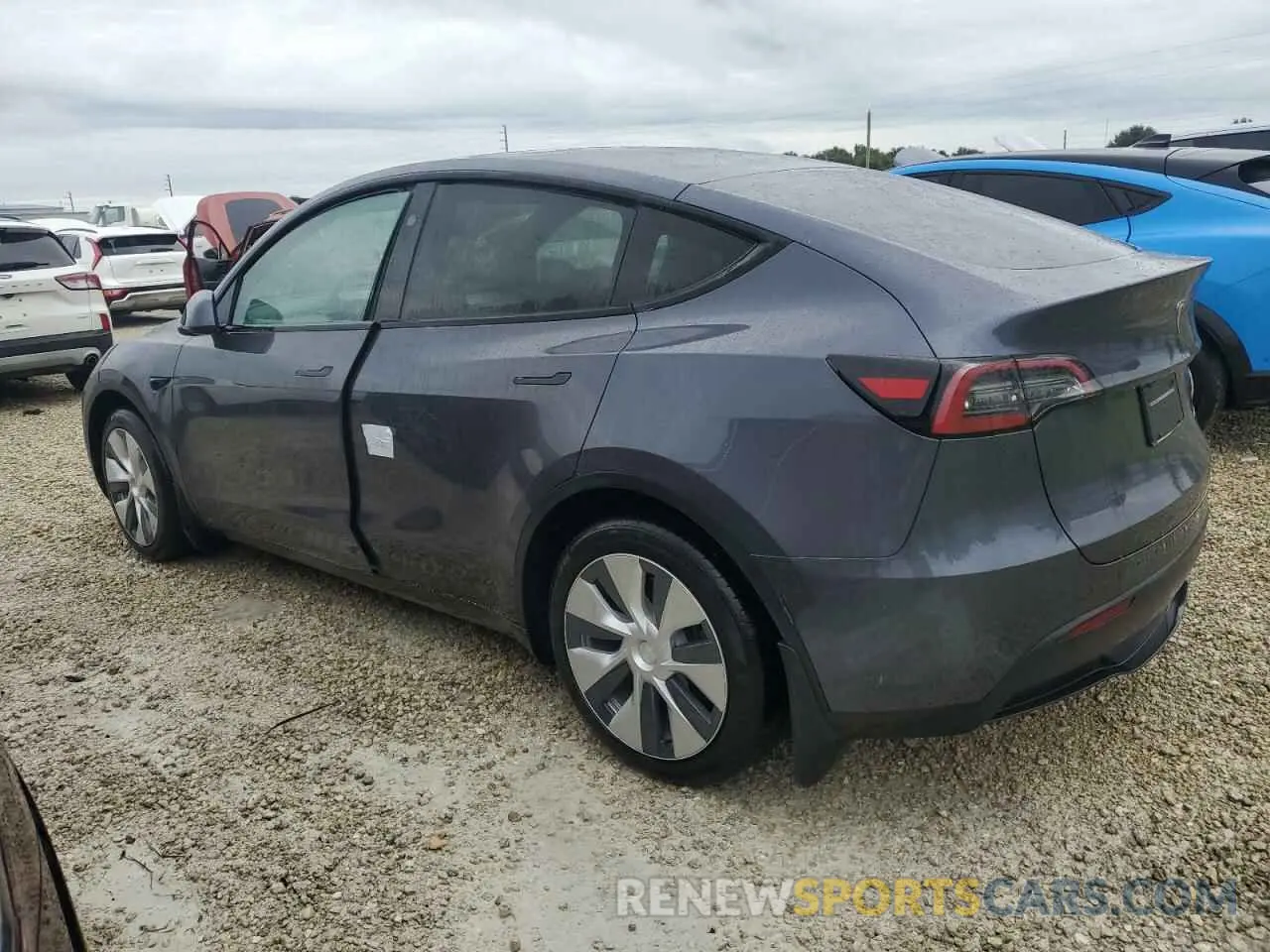 2 fotografías del automóvil dañado 7SAYGDEE8PF875383 TESLA MODEL Y 2023