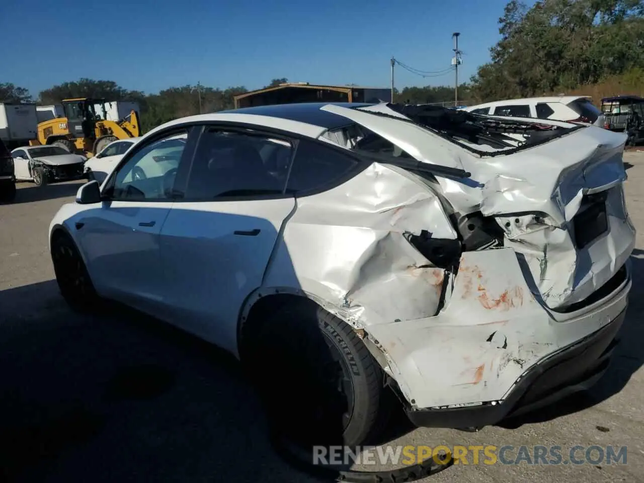 2 fotografías del automóvil dañado 7SAYGDEE9PA044407 TESLA MODEL Y 2023