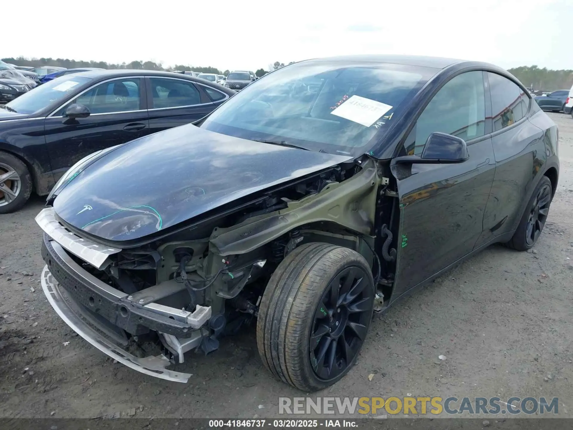 2 fotografías del automóvil dañado 7SAYGDEE9PA051535 TESLA MODEL Y 2023