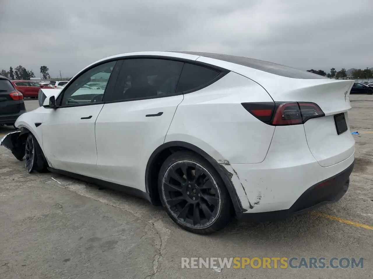 2 fotografías del automóvil dañado 7SAYGDEE9PA070232 TESLA MODEL Y 2023