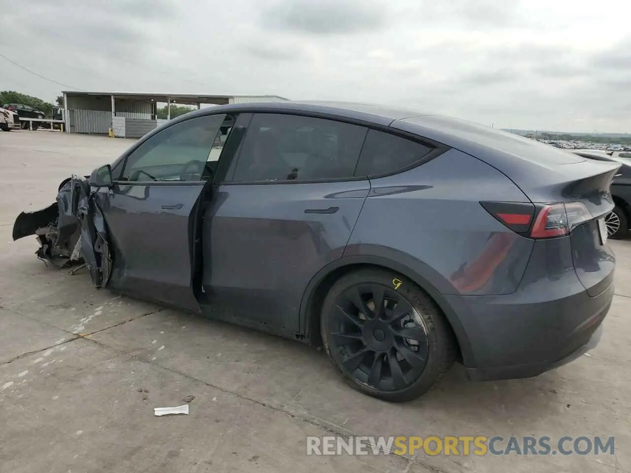 2 fotografías del automóvil dañado 7SAYGDEE9PA101155 TESLA MODEL Y 2023