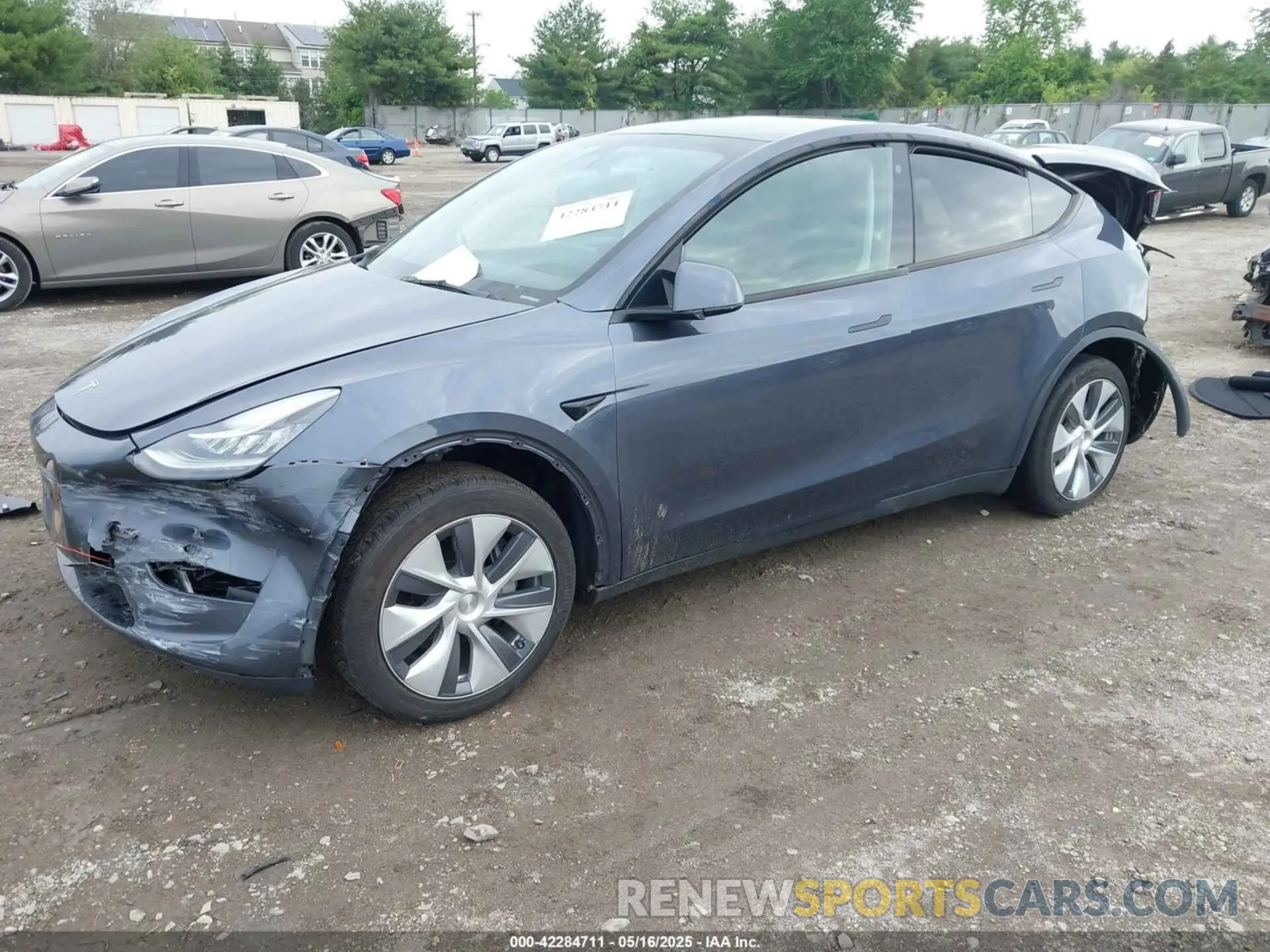 2 fotografías del automóvil dañado 7SAYGDEE9PA130624 TESLA MODEL Y 2023