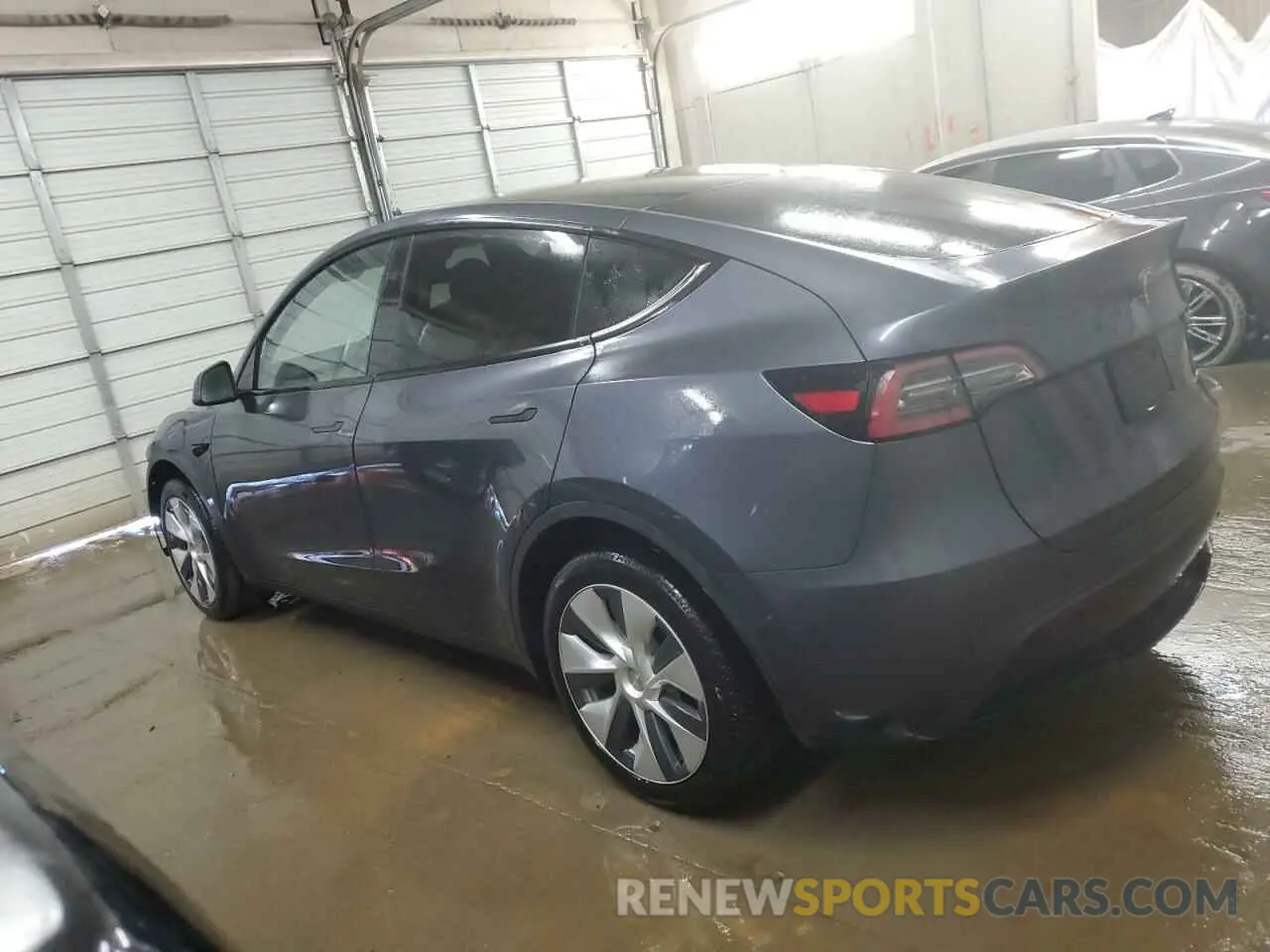 2 fotografías del automóvil dañado 7SAYGDEE9PA163235 TESLA MODEL Y 2023